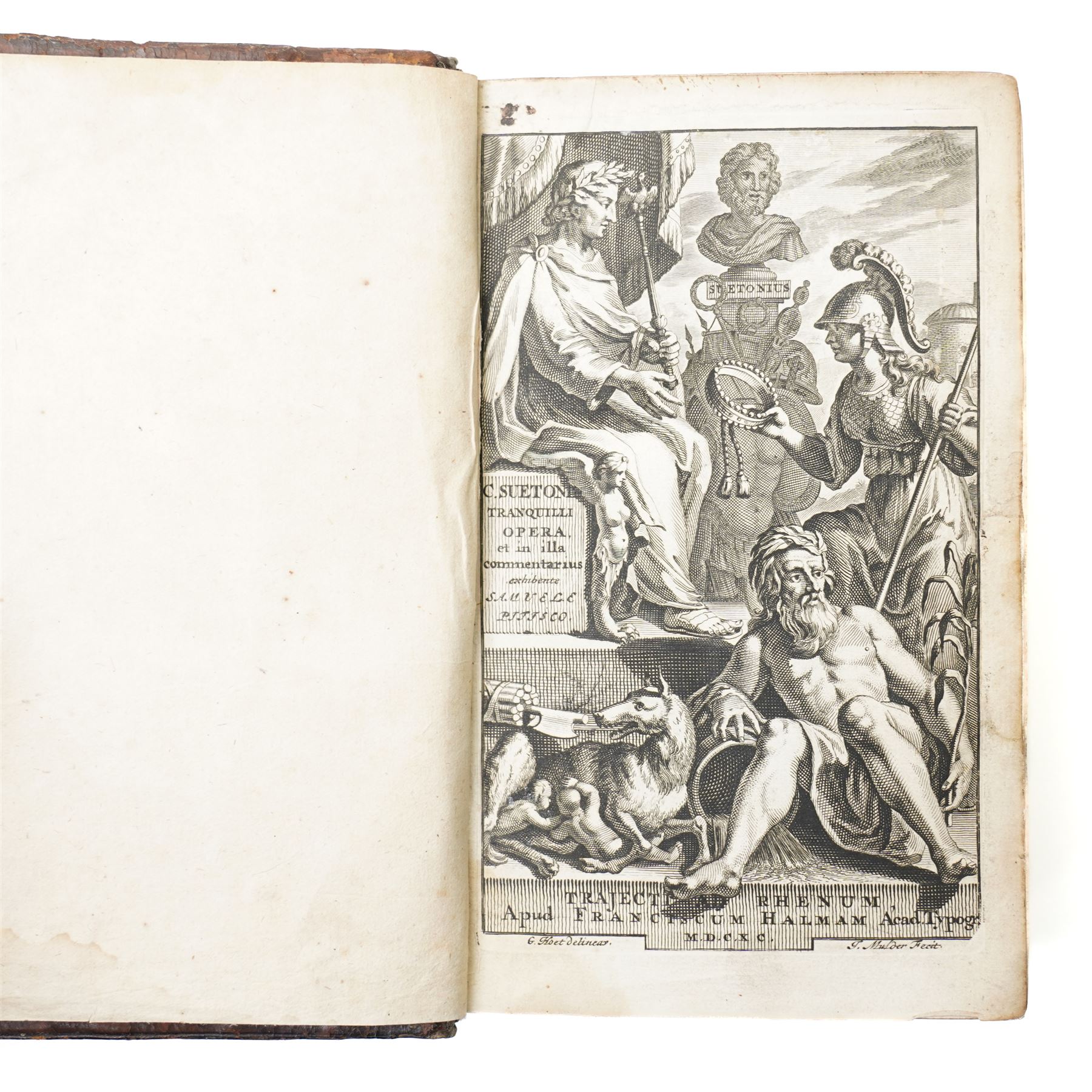 Suetonius Caius Tranquillus – 'Opera' with commentary by Samuel Pitiscus, published Utrecht: Franciscus Halma, 1690, First edition. An exceptional association copy, inscribed on the endpapers by Sir William Hamilton: “William Hamilton / Napoli,” and by Lady Emma Hamilton, who dates her signature “1797.” A further inscription reads, “Given me by my dear Sir William / Napoli,” a reference to the time when both Hamiltons were in Naples in 1797, during the height of their celebrated association with Horatio Nelson. Bound in full calf, with ribbed spines and gilt lettering.

Provenance: The Library of Sir William Hamilton; Lady Emma Hamilton; by descent to a cousin in Edinburgh (according to a memorandum by Andrew Baxendine, bookseller, 1892); later handled by George Bayntun, Bath (letters dated 1985 present).
The 1690 Utrecht edition, with Samuel Pitiscus’s seminal commentary, was a landmark in classical scholarship and perfectly reflects Sir William Hamilton’s deep antiquarian interests, particularly in Roman history.