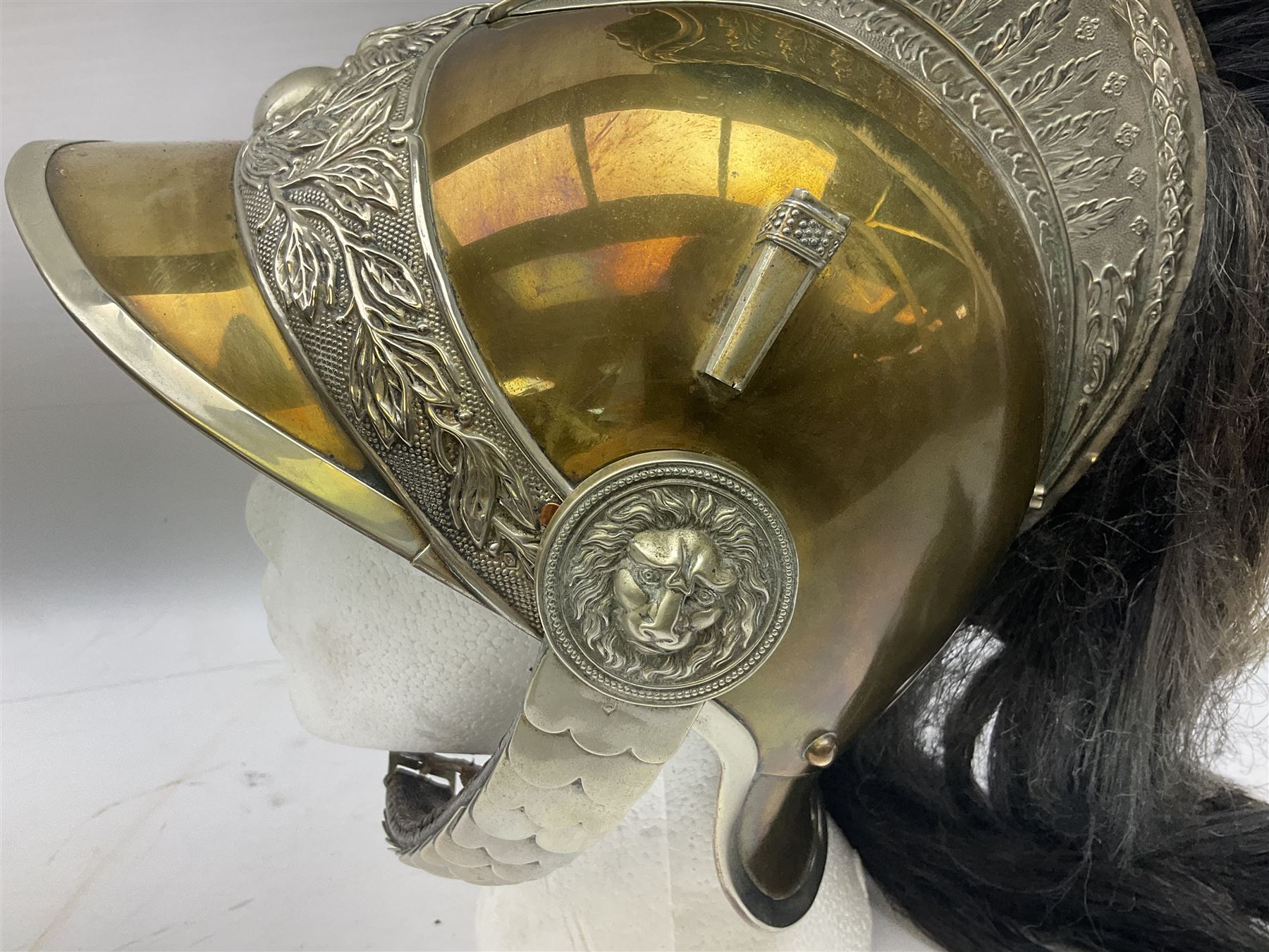 French Model 1913 mounted gendarmerie helmet; brass bodied with nickel mounts, chin strap, comb and horse-hair H27cm (no liner)