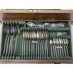 Canteen of silver plated cutlery, housed in a oak case with hinged lid and two drawers, together with a canteen containing twelve fish knives and forks 