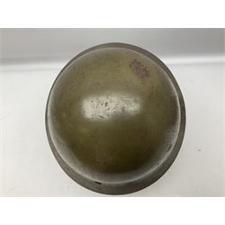 WW2 Japanese Army type 92 steel helmet with infantry star badge to centre, webbing liner and chin strap