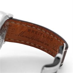 Breitling Chrono Cockpit gentleman's stainless steel diamond set automatic wristwatch, Ref. A13357, serial No. 2084732, cream dial with Roman numeral hour markers and date aperture, diamond set unidirectional rotating bezel, on Breitling brown leather strap, with fold-over clasp