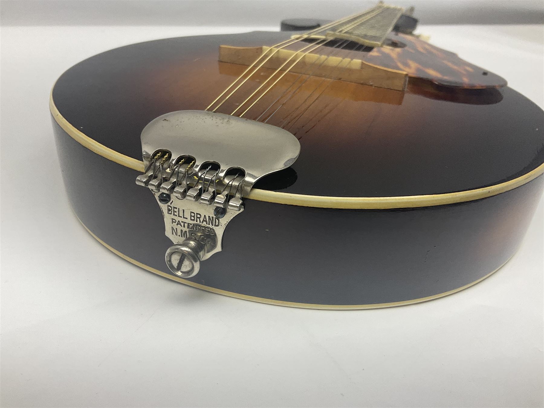 American Sterling T.B.C. Chicago eight-string mandolin with sunburst finish; bears maker's label; L63cm