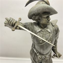 Spelter figure modeled as Cavalier with a raised sword, upon a circular base, H52cm