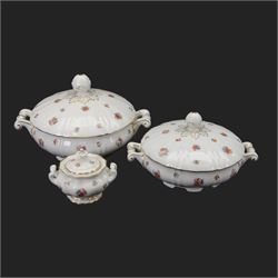 Forstenberg part tea and dinner service, comprising teapot, teacups and saucers, dinner plates, tureens, sauce boat, lidded sugar bowl, side plates and serving plates, all decorated with polychrome floral sprigs on a white ground with gilt edging