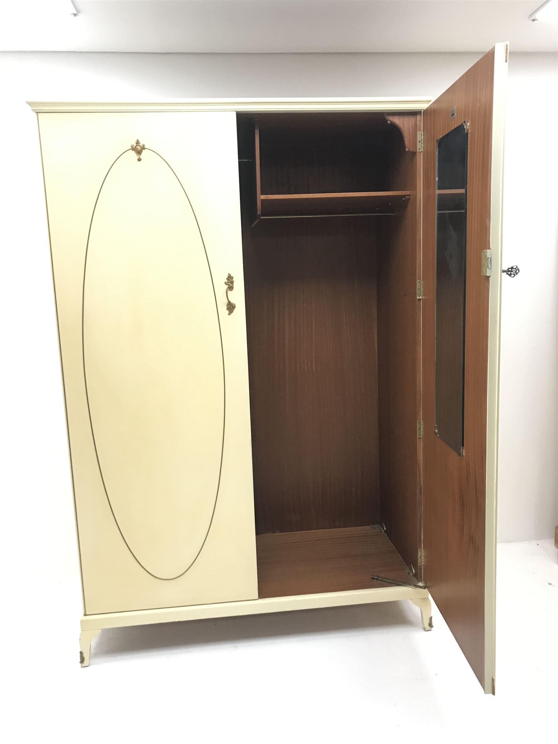 French style cream painted double wardrobe, two doors enclosing  single shelf and hanging rails, cabriole feet 