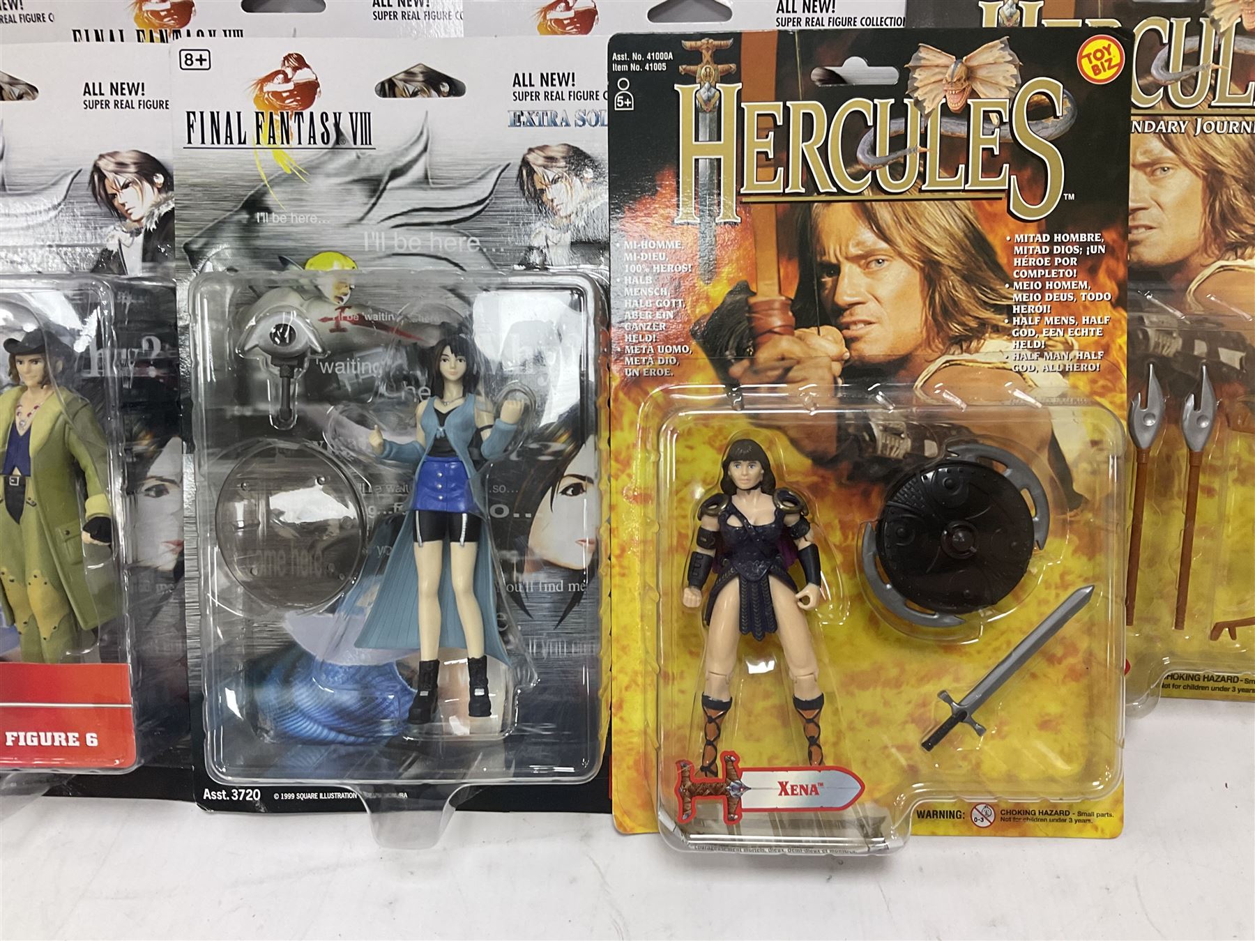 Twenty-three carded action figures including Fantasy VIII (6), Hercules (3), MIB (2), Robocop (2), The Golden Compass, The Incredibles (3), Wallace & Gromit (3), Robotech (2) and GI Joe; all in unopened blister packs (23)