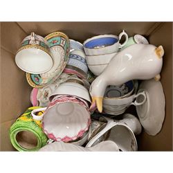 Nao vase in the form of a swan, together with various tea wares including 19th century and later tea cups and saucers, Royal Worcester coffee pot, without lid and other collectables, in two boxes 