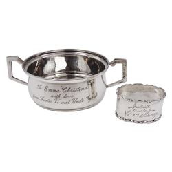 Mid 20th century silver porridge bowl, of circular form, with twin angular handles, with personal engraving to body, hallmarked Lanson Ltd, Birmingham 1942, together with a 1930s silver napkin ring, with shaped rim and personal engraving, hallmarked Walker & Hall, Birmingham 1937, bowl including handles H5cm