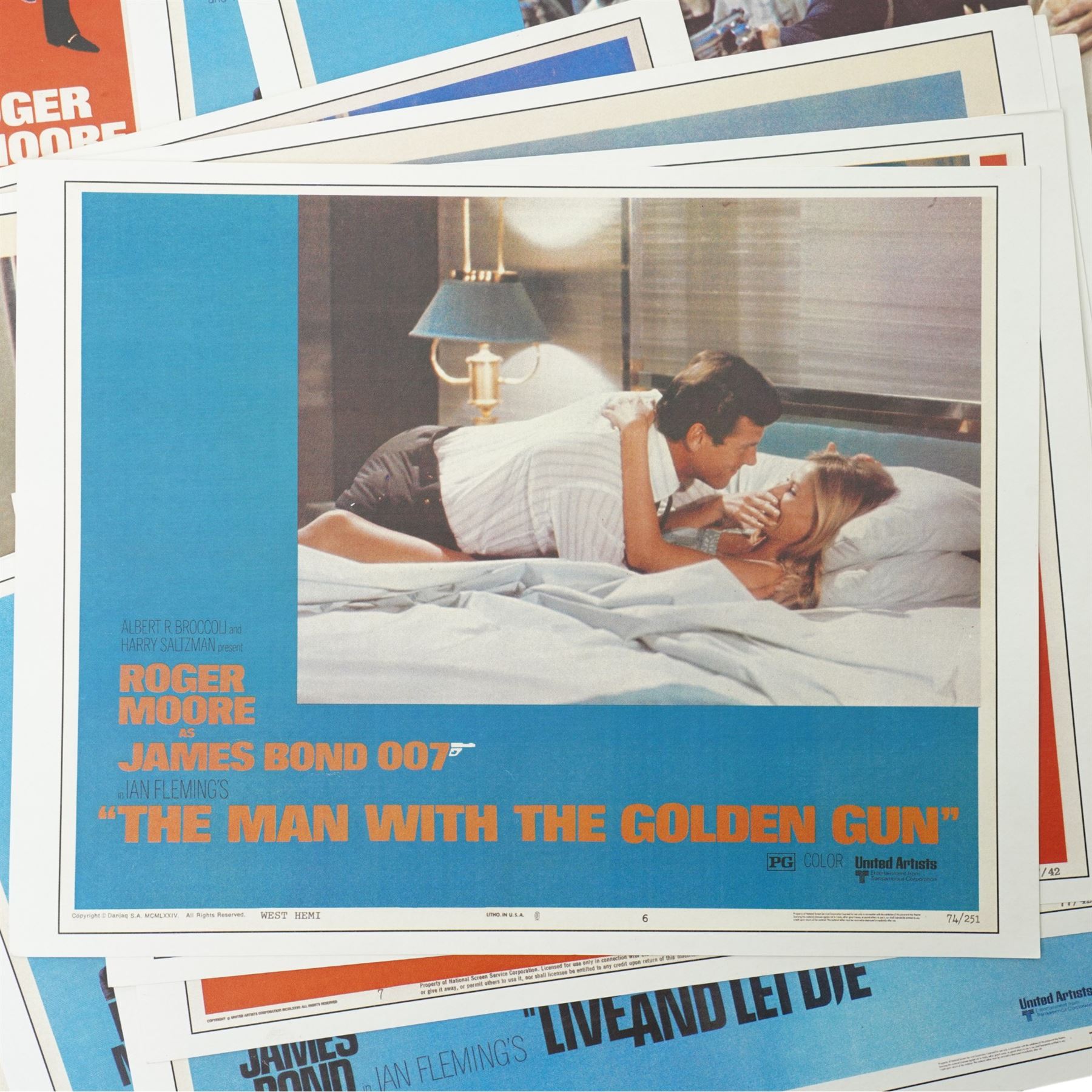  Collection of seventeen James Bond lobby cards starring Sean Connery and Roger Moore including Thunderball, You only Live Twice, Live and Let Die, From Russia with Love etc each 21cm x 27.5cm 