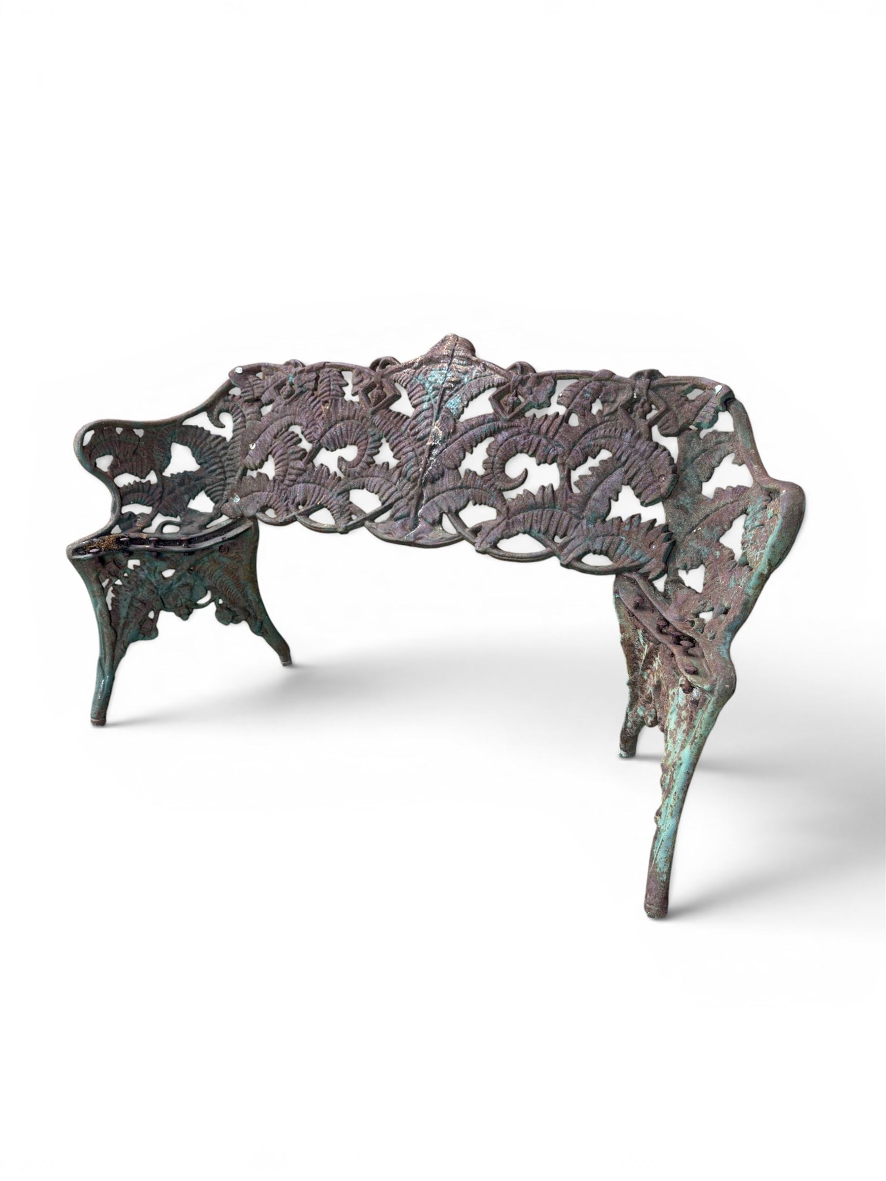 Victorian naturalistic design heavy cast iron garden bench, well defined fern pattern curved back-rest with arms, lacking seat slats for restoration