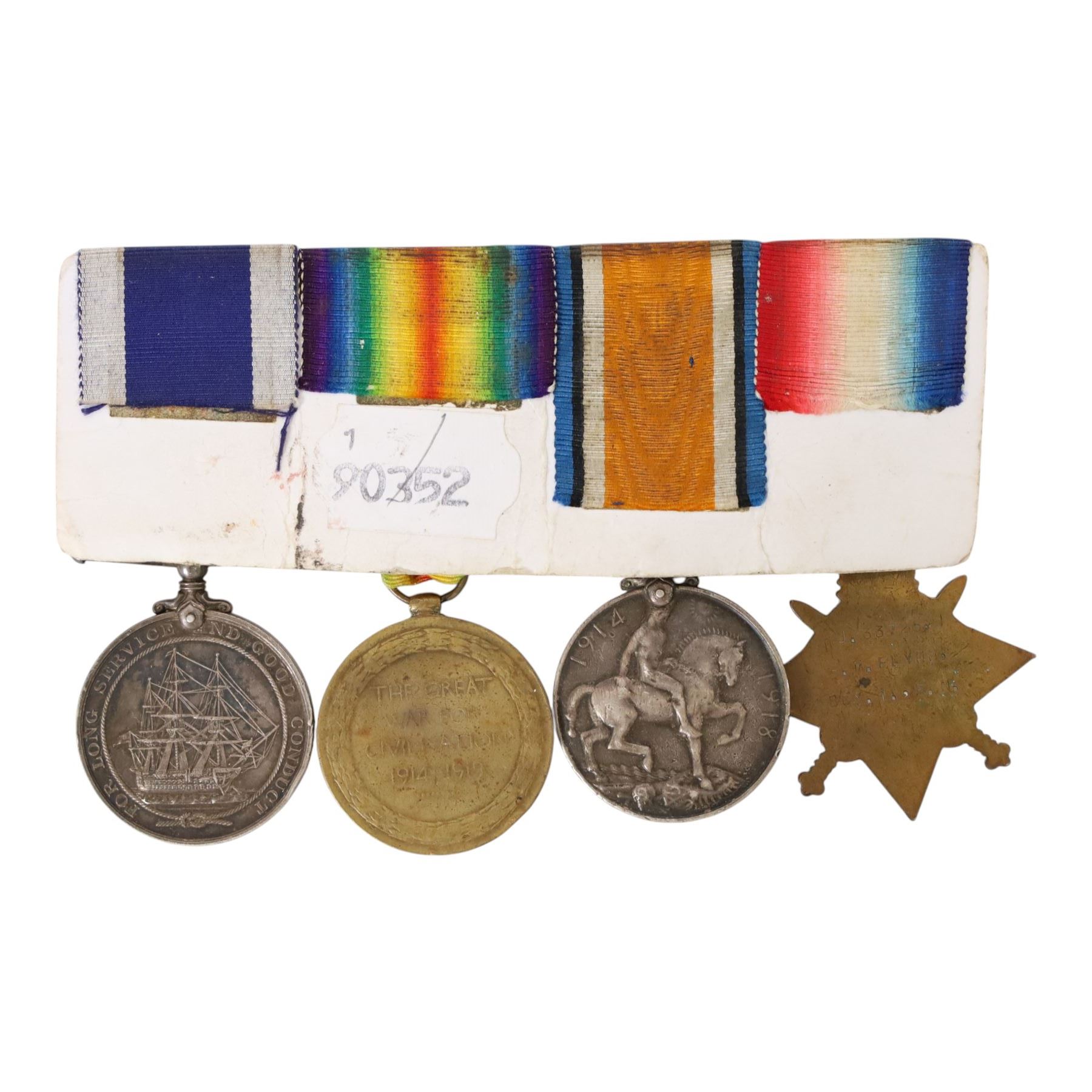 WWI Naval Long Service Group of Four Medals, comprising 1914-15 Star, British War medal, Victory Medal and Royal Naval Long Service and Good Conduct medal, awarded to J.33725, P.M.Flynn Boy.1., R.N. (later A.B. H.M.S. Queen Elizabeth)