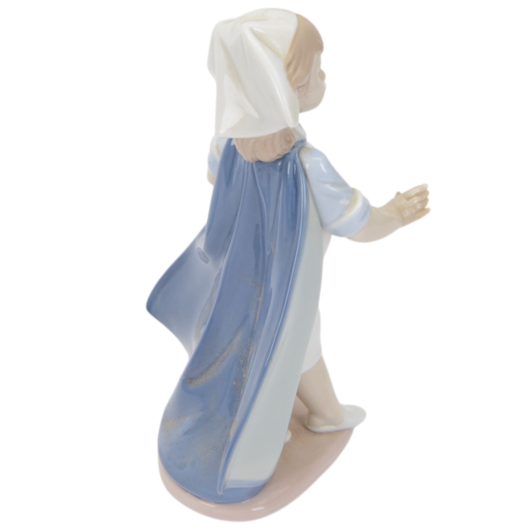 Four Lladro figures, comprising Loving Care no 6087, Young Nurse no 6307, Girl with Chicken no 4592 and Female Physician no 5197, three with original boxes 