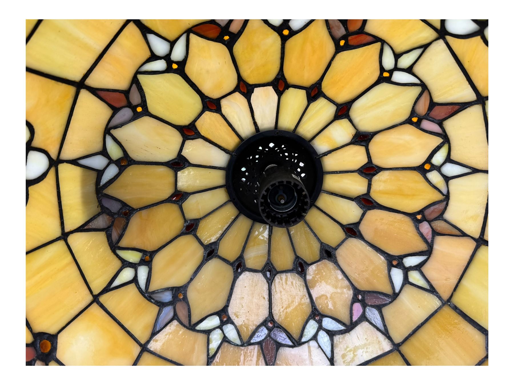 Collection of Tiffany-style light shades, to include six bowl-shaped wall-mounted fittings with floral and berry motifs and three ceiling-mounted light shades