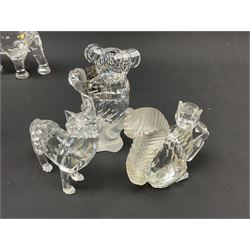 Twenty nine Swarovski Crystal animals, to include koala and baby, in frosted tree branch, elephants, polar bears, squirrel, monkeys, panda, unicorn and snails, etc 