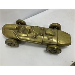 Large brass model of a vintage sport car with functioning wheels L57cm