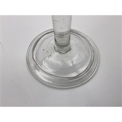 18th century wine glass, the trumpet shaped bowl upon tear drop stem and conical folded foot, H15.5cm, together with an 18th century cordial glass, the round funnel bowl on plain knopped stem and folded conical foot