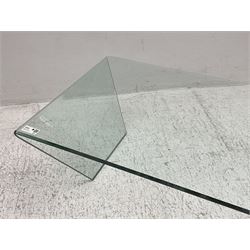 Contemporary glass coffee table, rectangular top with polished edge, on shaped end supports