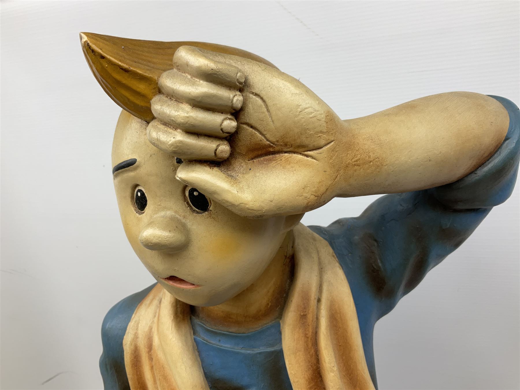 Fibreglass promotional/advertising figure of Herge's Tintin with baseball bat, standing mopping his brow and wearing plus-fours, a towel around his neck and holding a can of Coca-Cola H90cm; with similar figure of his dog Snowy seated with a baseball in his mouth (3)