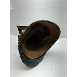 16th Queens Lancers Officers Lance Cap, black leather body with gilt braid lace and gilt wire braiding to the peak, officers silver gilt helmet plate to the front, the black cloth mortar board top with thick bullion wire, the bullion socket holder with embroidered GR cipher to the centre, lion head side bosses with velvet backed linked chinstrap, interior with leather sweatband and cloth lining, marked Carter & Co Pall Mall, the helmet is housed in japanned storage tin with brass plaque engraved “Lieu H L Evans, 16th Lancers'