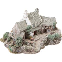 Four Lilliput Lane models, comprising Oakwood Smithy, We Plough the Fields and Scatter, Bluebell Farm and Highghyll Farm
