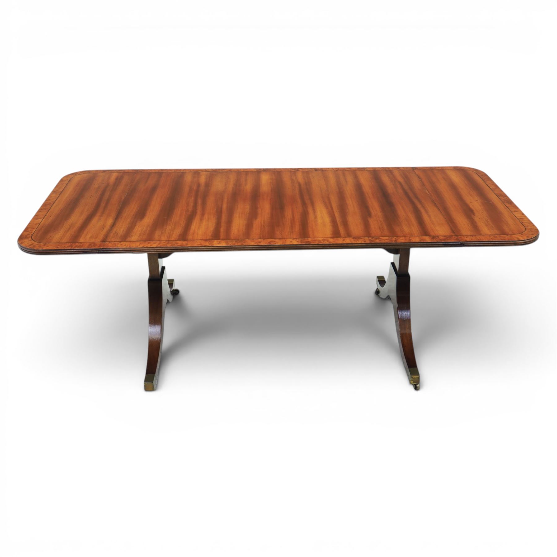Regency design mahogany drop leaf coffee table, rectangular top crossbanded in walnut, twin pillar legs