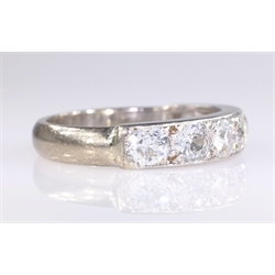  White gold brilliant cut diamond seven stone half eternity ring tested to 18ct  