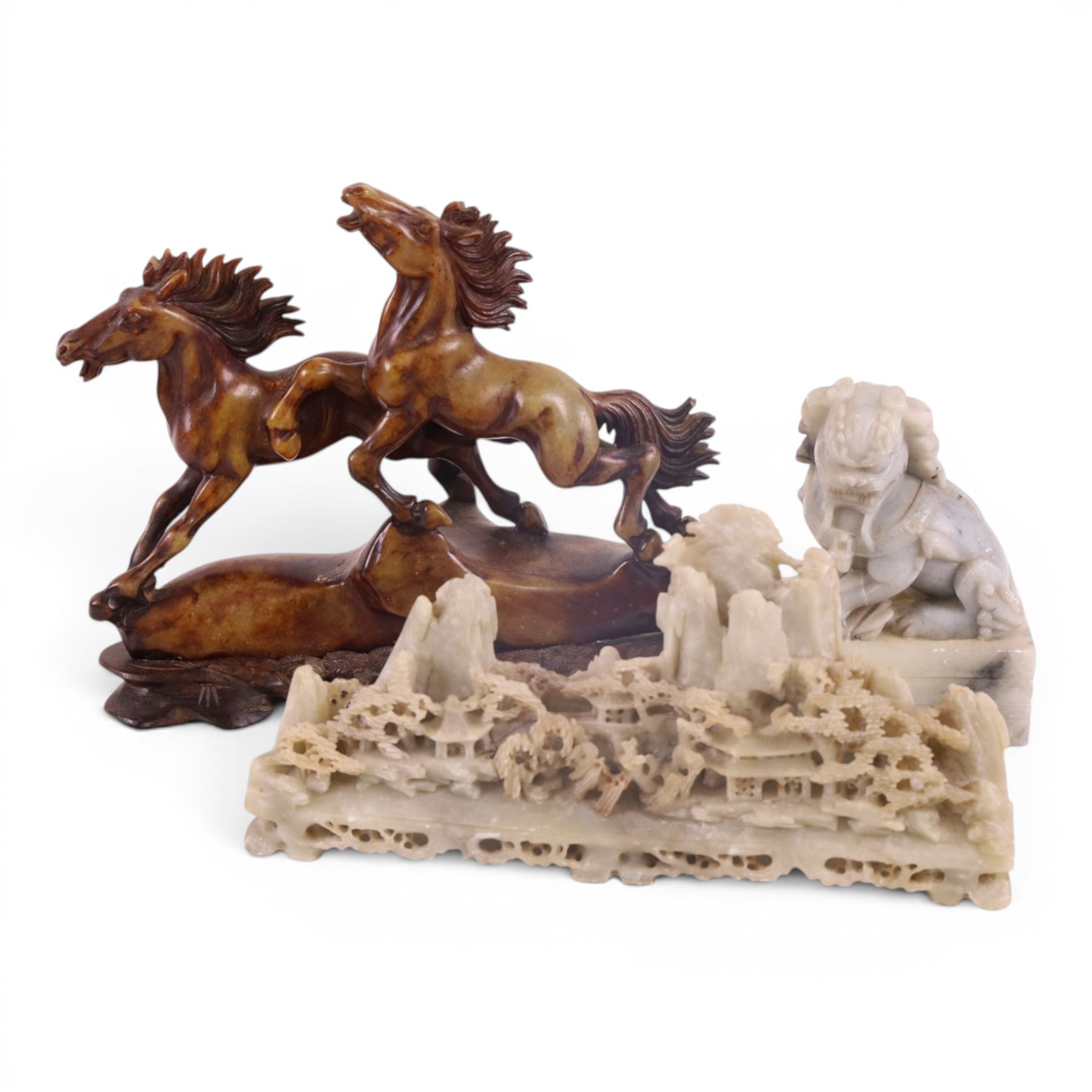 Carved hardstone figure of running horses, together with pair of soapstone foo dogs, and similar 