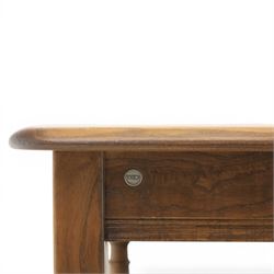 Ercol -  dark elm corner TV stand and coffee table, TV stand with drop triangular leaf, over open recess above a single drawer (H 47cm, D 44cm with leaf 79cm, W 73cm,  the coffee table with chamfered rectangular top with full length undertier, raised on turned supports (H 43cm, D 54cm, W 115cm) 