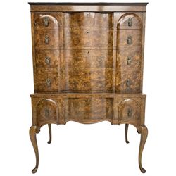 Early to mid-20th century figured walnut chest on stand, four graduating drawers on stand fitted with single drawer, drop handles in the form of shields with three recumbent lions, on cabriole supports