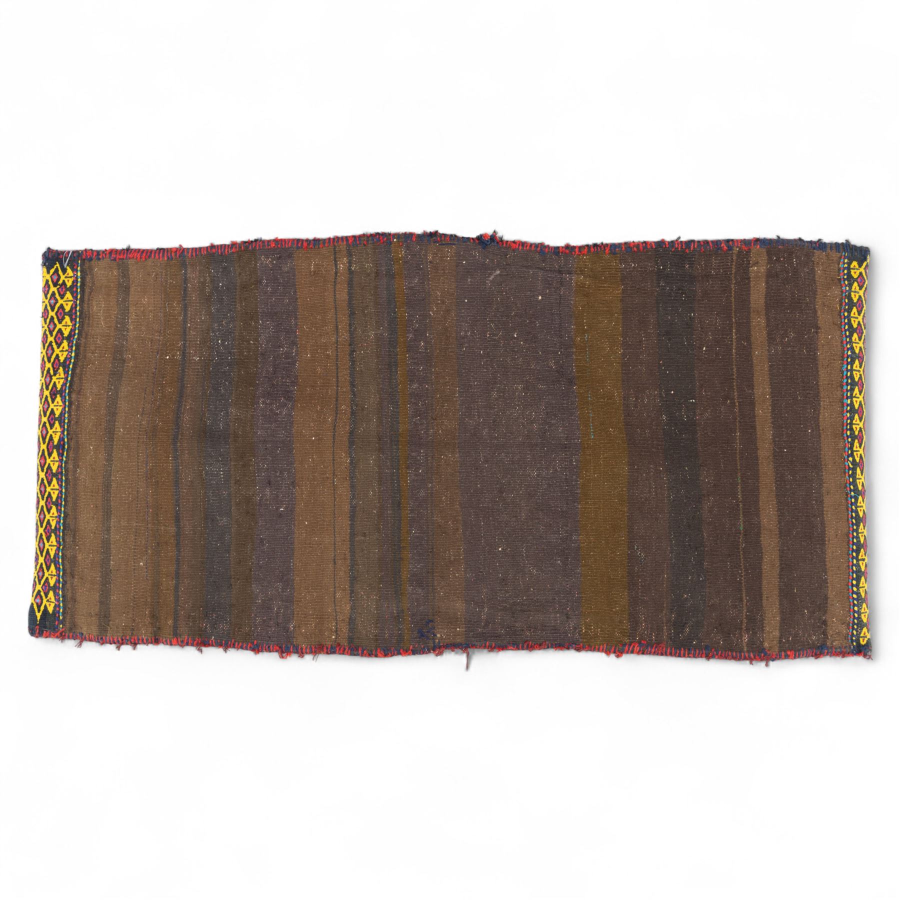 Persian Turkoman double saddlebag, north eastern region, with horizontal bands of multicoloured diamond motifs on a cream field, geometric border bands in red and black, joined with woven and wrapped centre panel