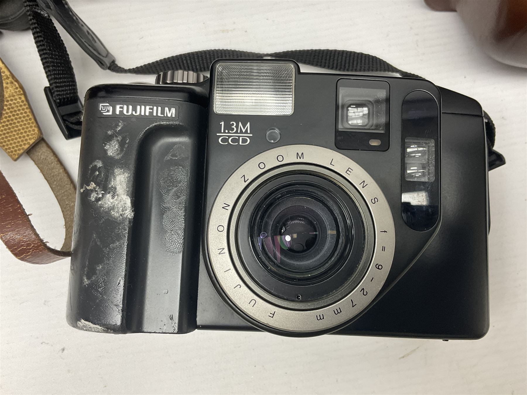 Collection of cameras and lenses, to include Pentax Program A camera body, serial no 123759, with 'Pentax-A zoom 1:3.5-4.5 28-80mm' len, Praktica EE2 camera body with 'Pentacon electric 1.8/50' lens etc, together with a Manfrotto tripod 