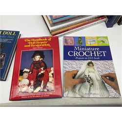 Over twenty reference books on dolls including Barbie and other fashion dolls etc