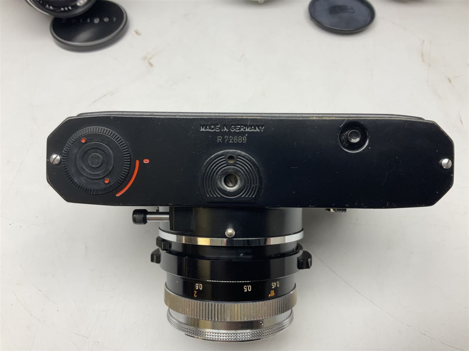 Four Zeiss Ikon camera bodies, to include, Contaflex Super B camera body, serial no. B31591, with 'Carl Zeiss Tessar 2.8/50 lens, serial no.3425553, Contaflex Super BC camera body, serial no. P81728, with 'Carl Zeiss Tessar 2.8/50' lens, serial no 4822280, etc, together with three cased lenses; 'Carl Zeiss Pro-Tessar 1:4 f=115mm' lens, serial no 3734740, 'Carl Zeiss Pr-Tessar 1:3.2 f=85mm' lens, serial no. 3647764 and 'Carl Zeiss Pr-Tessar 1:3.2 f=35mm' lens, and other Zeiss Ikon equipment 