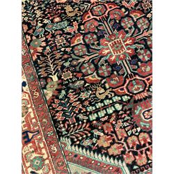 Persian Malayer rug, the field decorated with tree of life, floral, animal and bird motifs, surrounded by three band border with geometric design