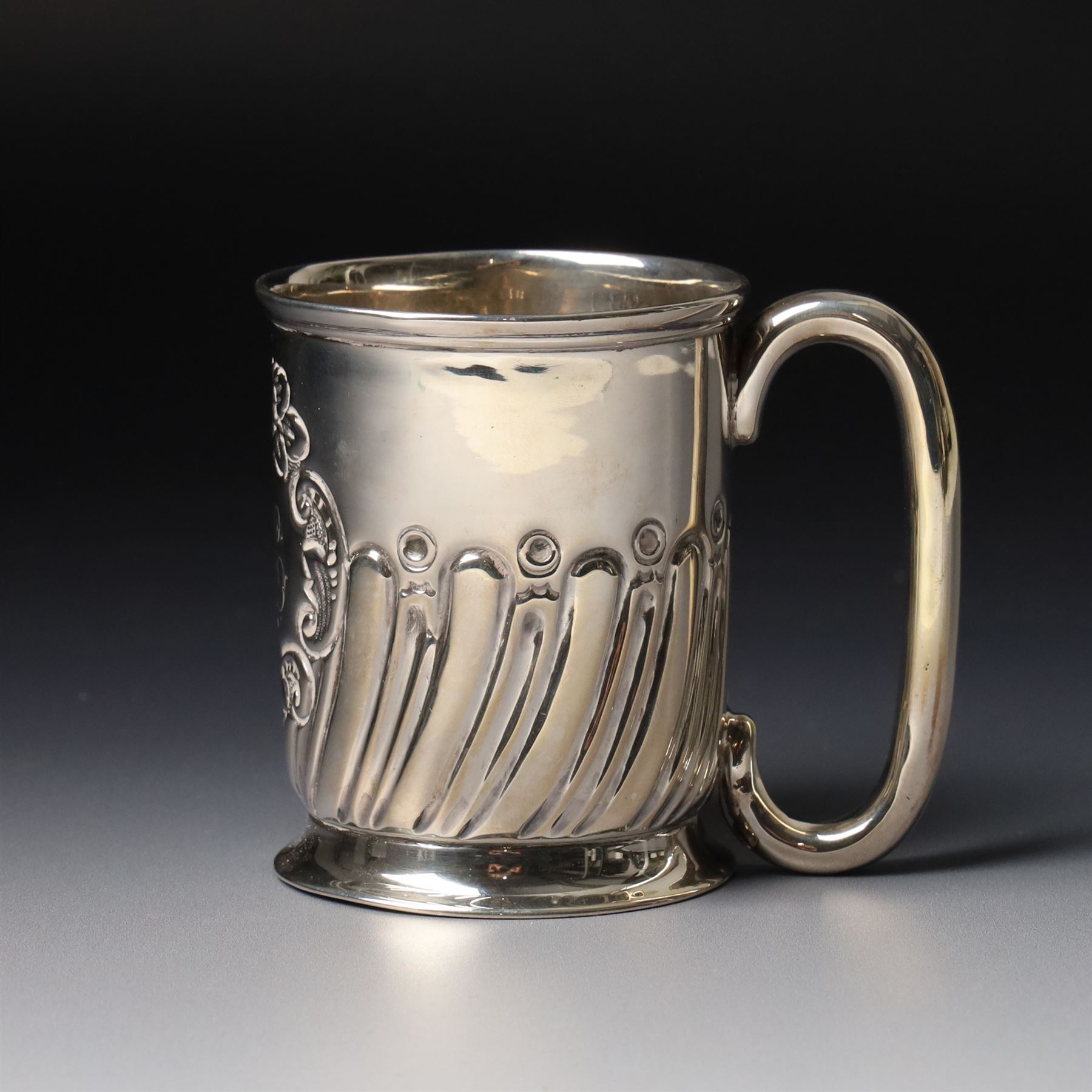 Edwardian silver christening mug with engraved decoration H8cm Birmingham 1902 and two others 1900 and 1902