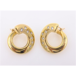  Pair of 18ct gold diamond set ear-rings, swirl design stamped 750  