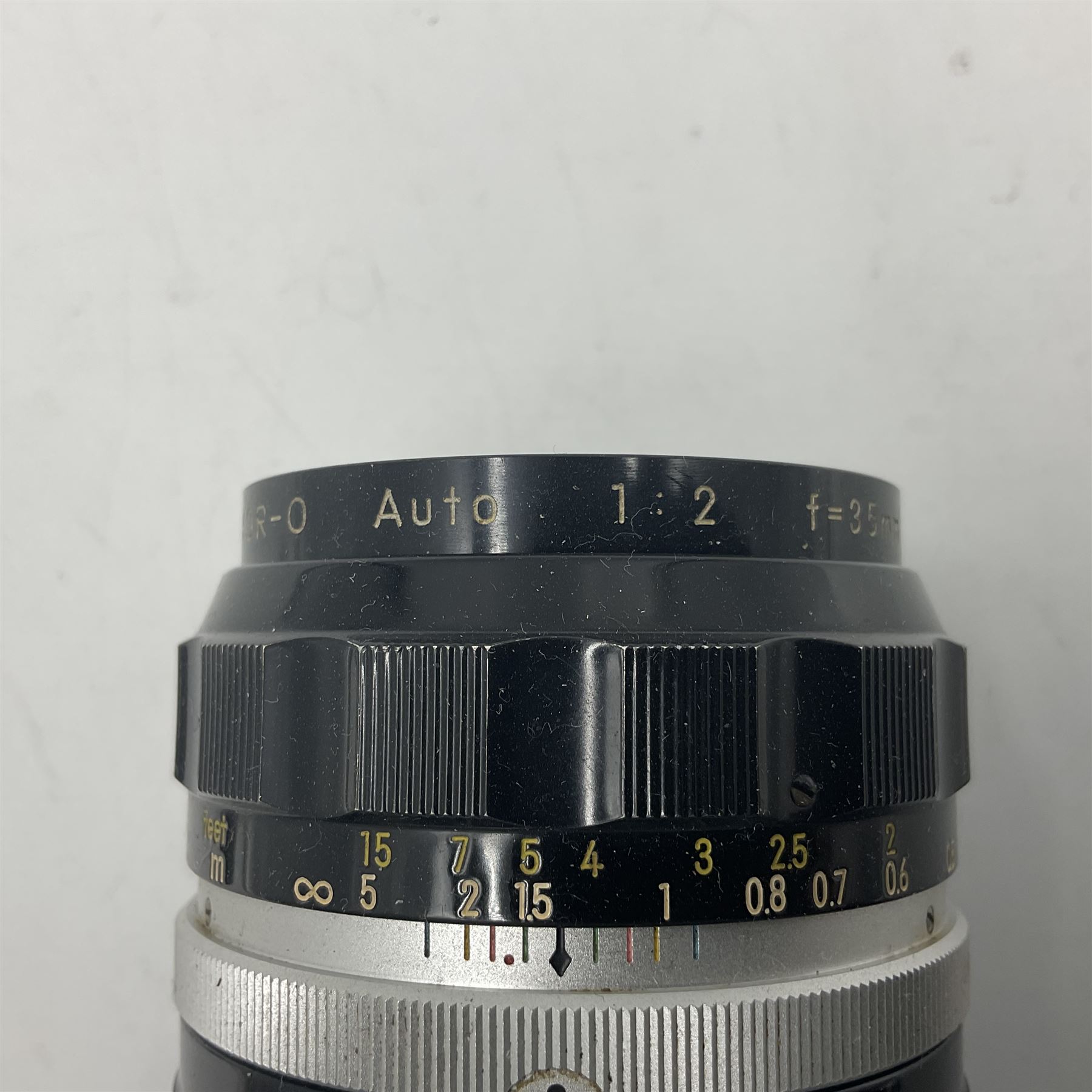 Nikon photomic Ftn camera body, with red engraving, serial no 7006572, circa 1969, with 'Nikon NIKKOR-O Auto 1:2 f=35mm' lens, serial no. 830478