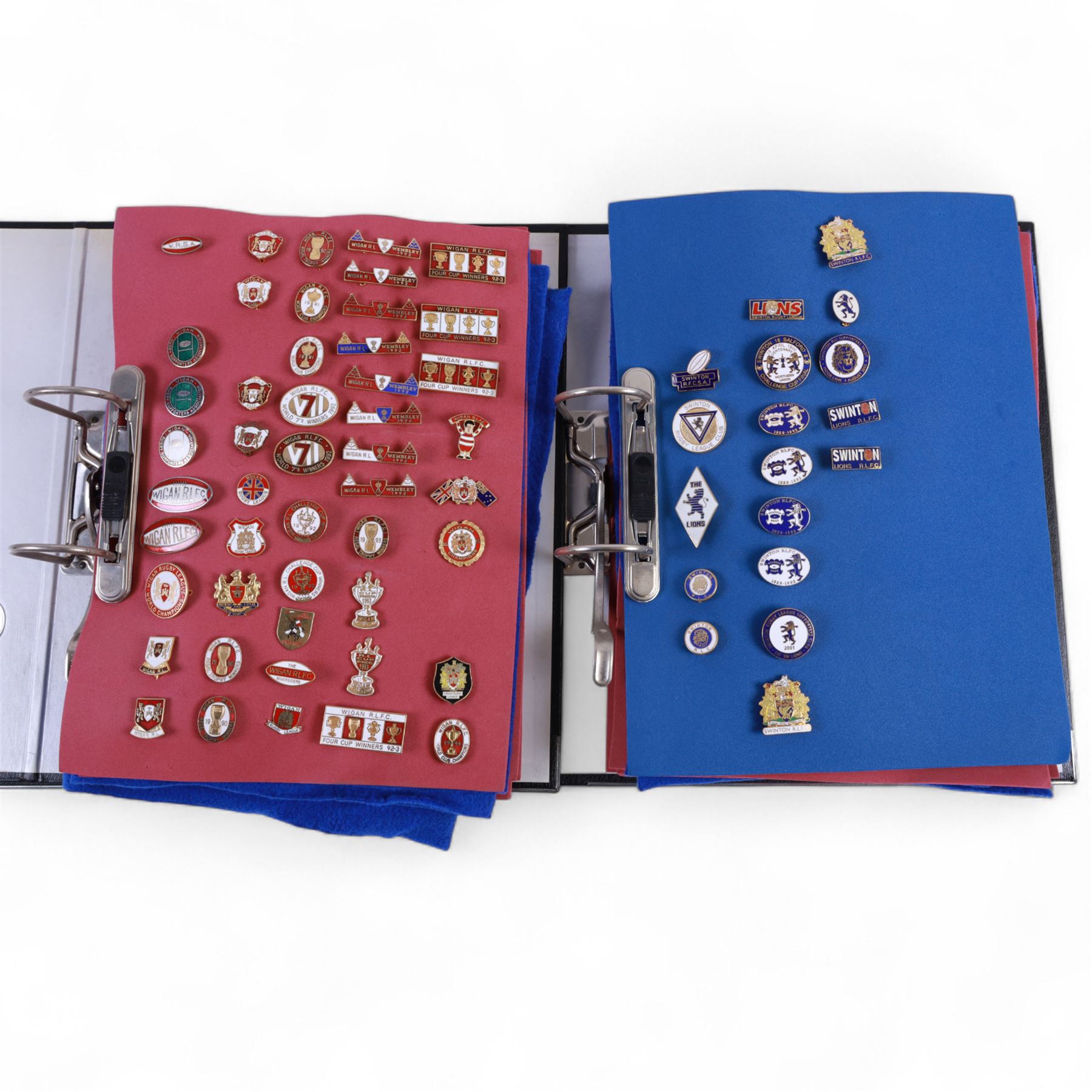 Rugby league enamel badge collection, from Swinton Lions, Wakefield Trinity, Warrington Wolves, Whitehaven, Widnes Vikings, Wigan Warriors, Workington Town and York City Knights, including Wigan Wembley and Cup Winners examples, housed in two folders, (approximately 300)