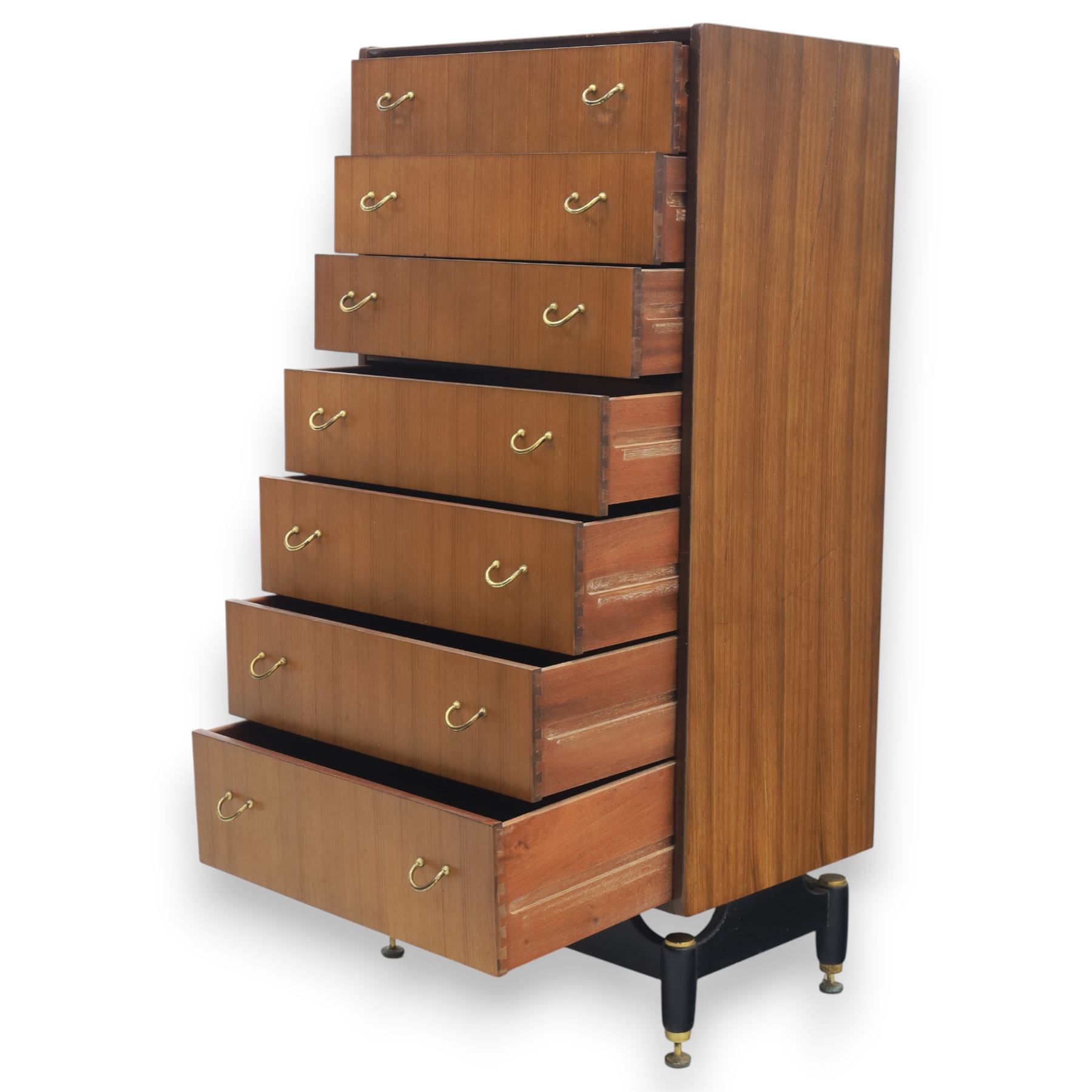 G Plan - 'Librenza' tola wood chest of seven drawers, gold coloured metal pulls on an ebonised based with gold coloured feet