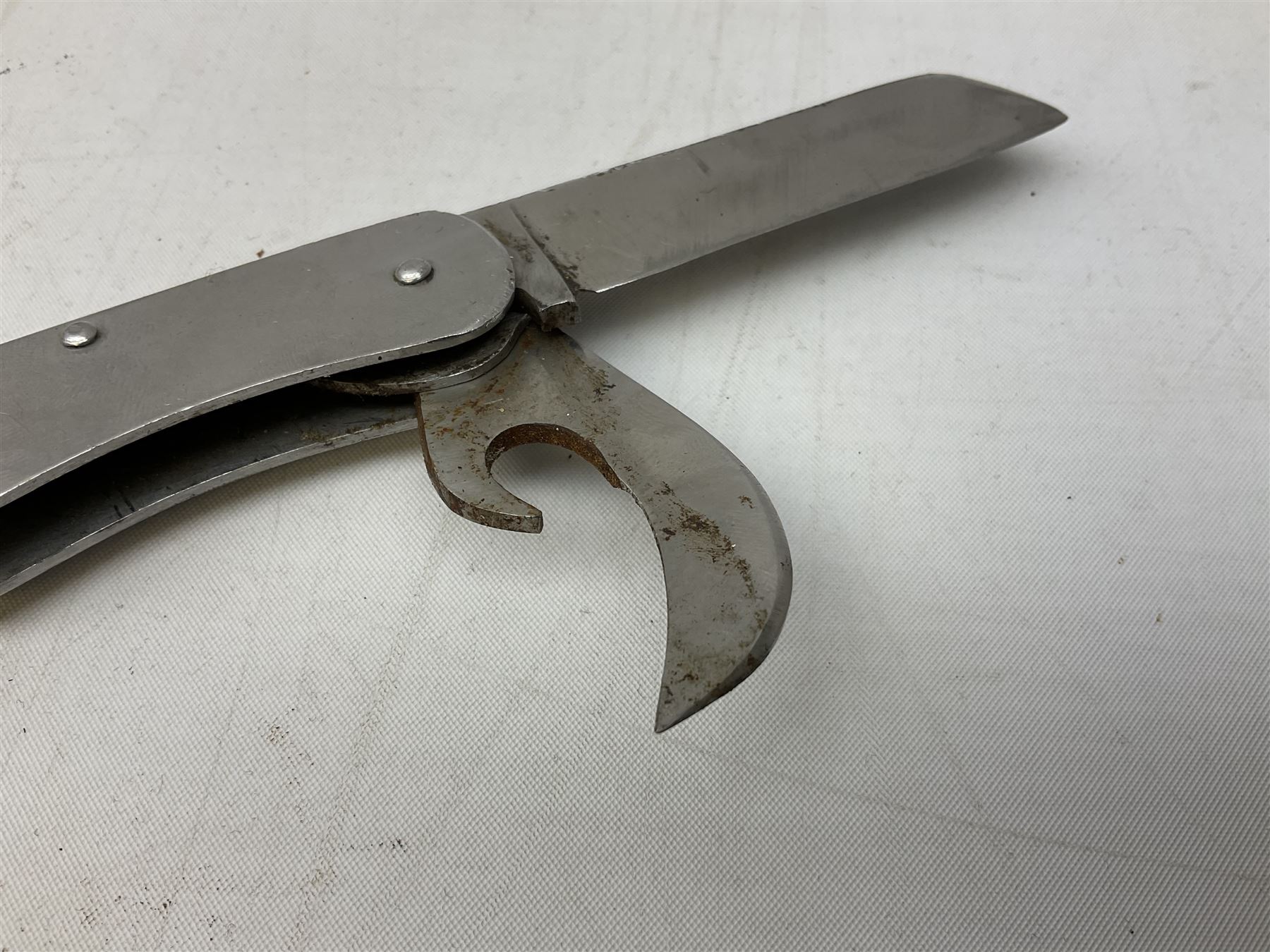 British Pattern 1876 socket bayonet with 43cm steel triangular blade L52cm overall; another socket bayonet with cruciform blade; No.4 Mk.II spike bayonet in metal scabbard with webbing frog; and 1955 Army jack knife by J.H. Thompson Sheffield (4)