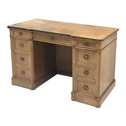 20th century mahogany and walnut pedestal desk, one long and two short drawers, each pedestal fitted with three drawers, reeded detailing