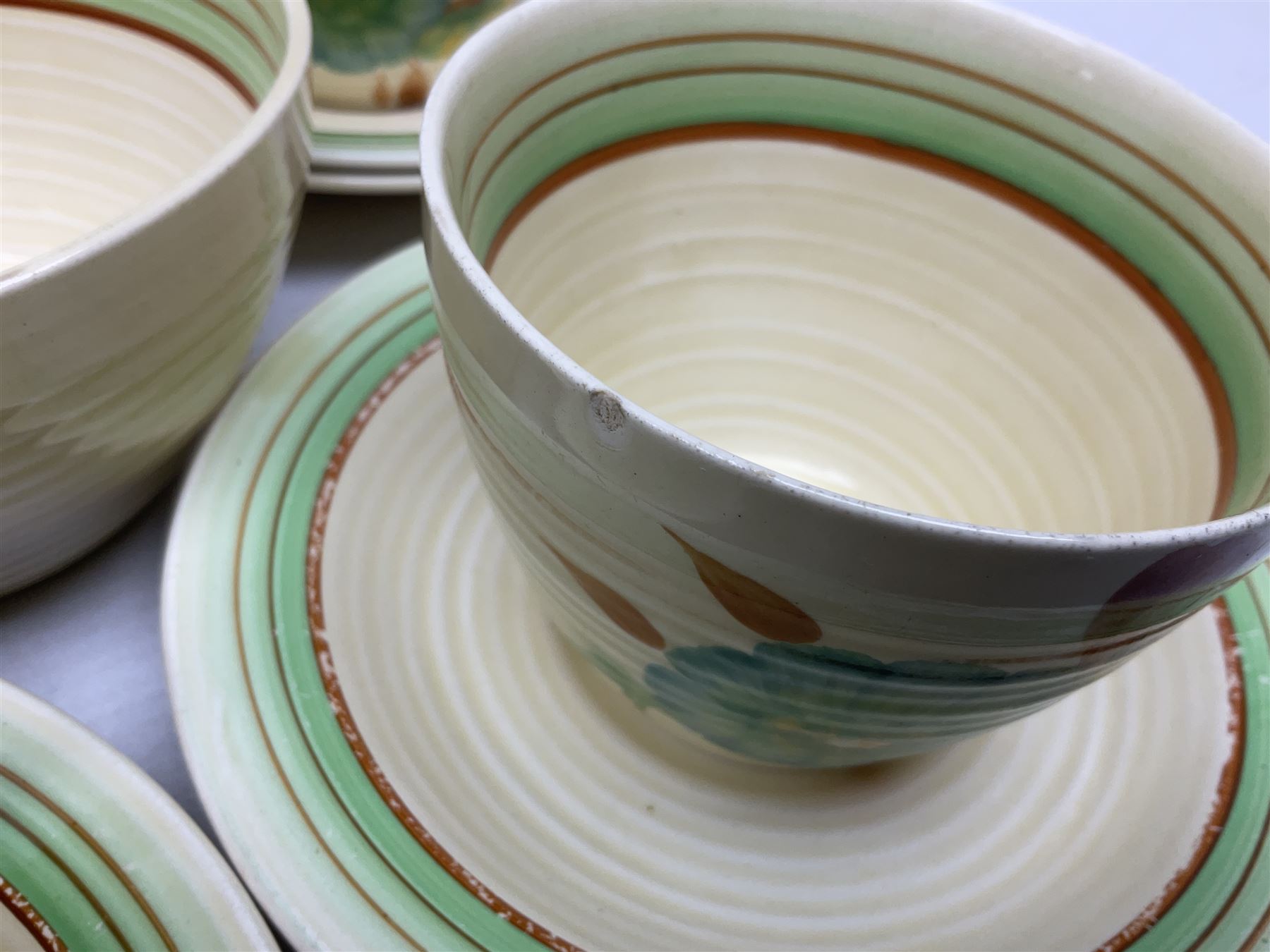 Wilkinson Clarice Cliff honeydew pattern tea service for eight, comprising teapot, milk jug, open sucrier, teacup and saucers, dessert plates and two side plates (29)