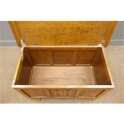  Mid 20th century oak blanket box, planked top with linenfold centre panel front on bracket feet, W92cm, H55cm, D48cm  