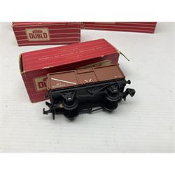 Hornby Dublo - sixteen goods wagons comprising 4644 21-Ton Hopper Wagon, 4315 Horse Box (BR) with horse, 4316 Horse Box (SR) with horse, 4649 Low Sided Wagon with tractor, 4301, 4310, 4311, 4312, 4313, 4320, 4626, 4648, 4652, 4675, 4678 and B550200 (Mineral Wagon); all in red boxes (16)