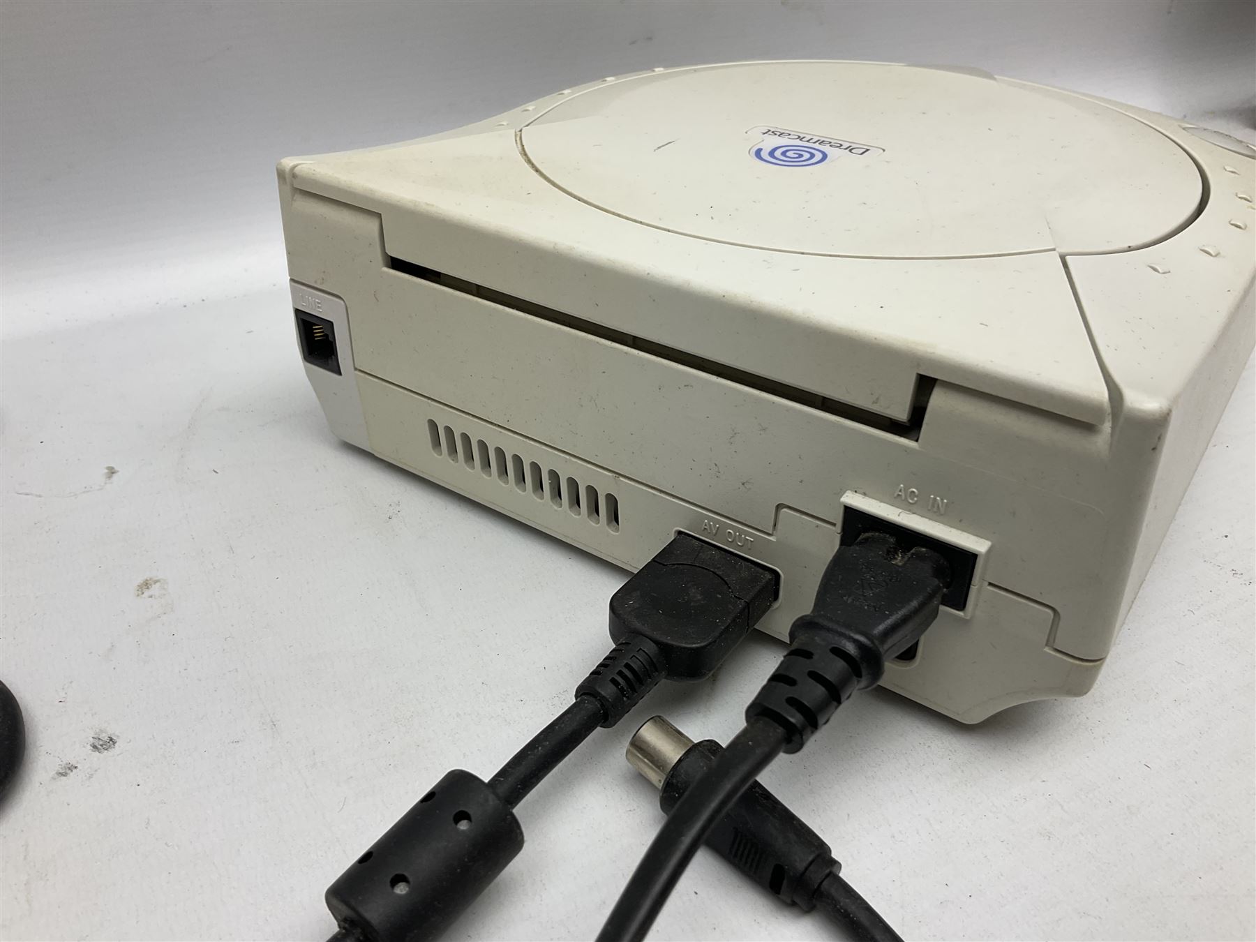 Dreamcast console, one controller, original instruction booklet with magazine and four games, ‘Aerowings’, ‘Buggy Heat’, ‘ Racing Simulation Monaco Grand Prix’ and ‘Who Wants to be a Millionaire’, all in original cases with instruction booklets 