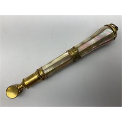 Pair of Victorian mother of pearl and gilt brass opera glasses, with detachable handle, marked W Gregory & Co 51 Strand London