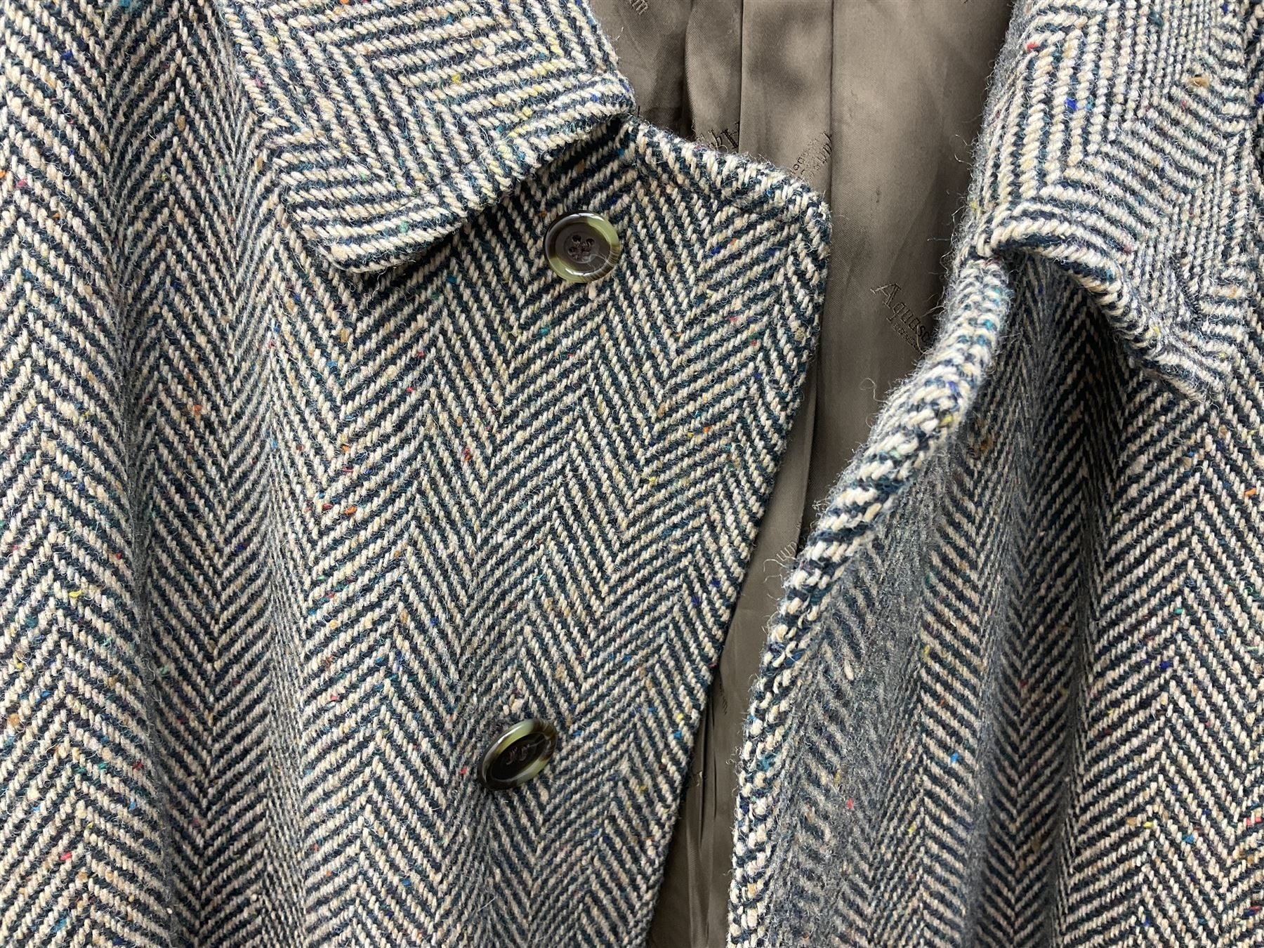 Men's Aquascutum lambs wool herringbone tweed coat with silk lining, 46 Reg, together with a further Men's Aquascutum grey wool duffle coat, with cheque lining and horn buttons, 46