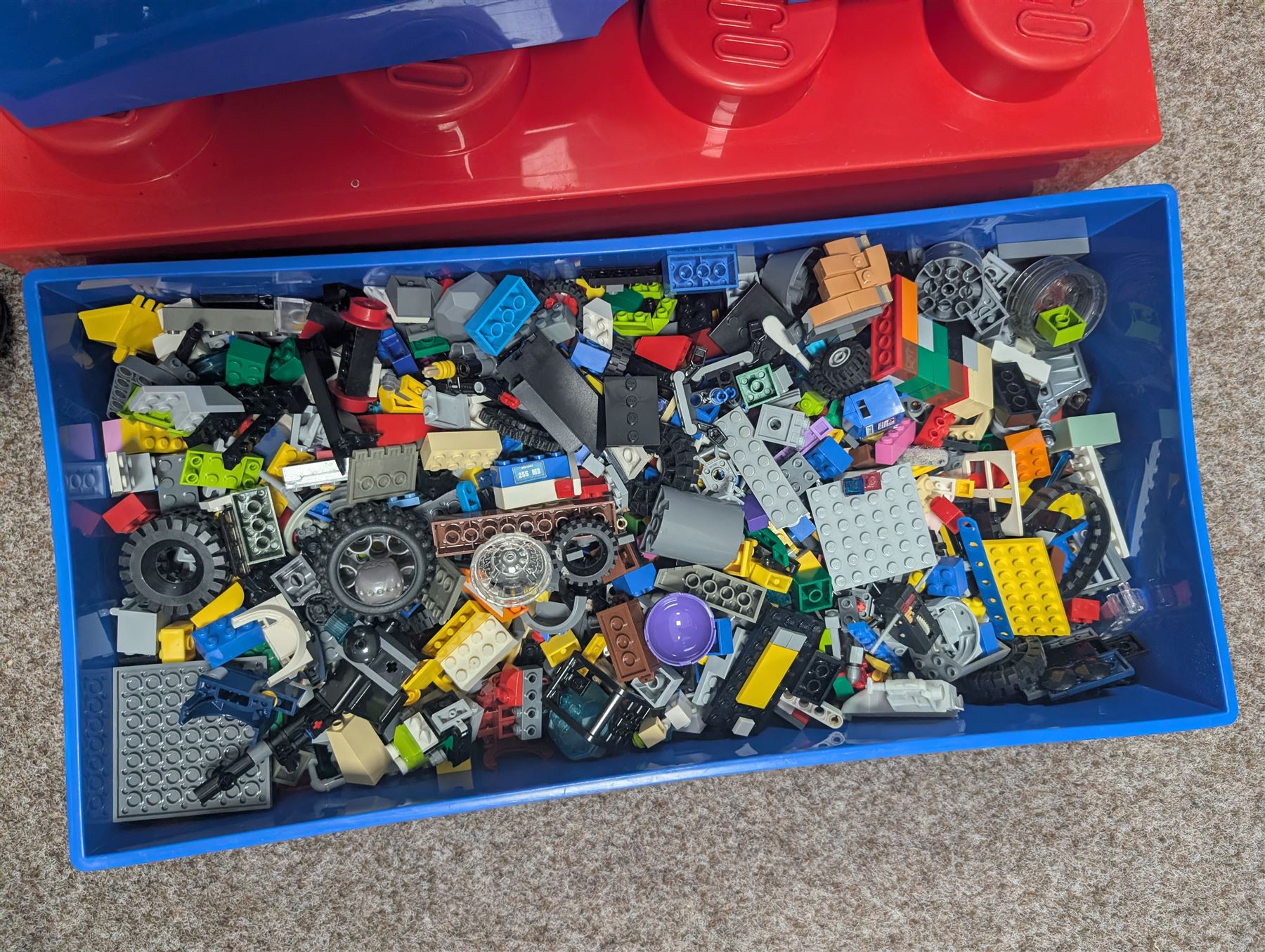 Collection of loose Lego, contained in three stackable Lego brick boxes