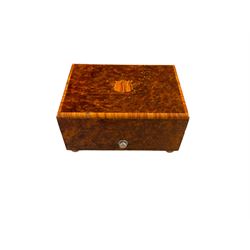 20th century burr wood Swiss musical box, marbled beneath 'made in Switzerland', paper label inscribed 'Around the world The Lass of Richmond Hill', H6.5cm W12.5cm D9cm