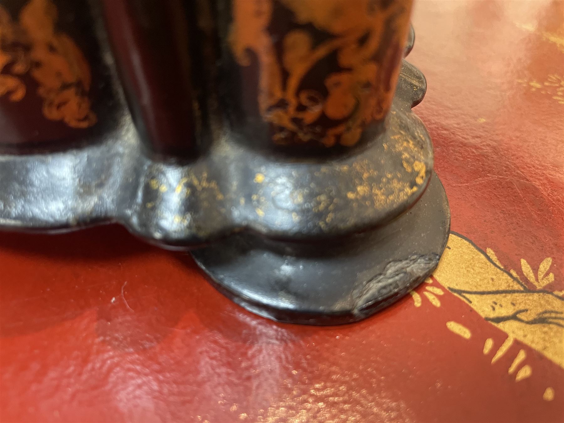 Victorian black lacquered papier-mâché sewing box, of rectangular form with shaped sides, the slightly domed top with inlaid mother of pearl and abalone decoration, the sides with gilt and polychrome painted scrollwork, the hinged cover opening to reveal a fitted interior with lift out tray, H14cm